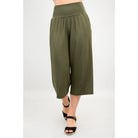 Blue Sky Gaylene Capri in Khaki shown on a model against a white background, from the front view. 