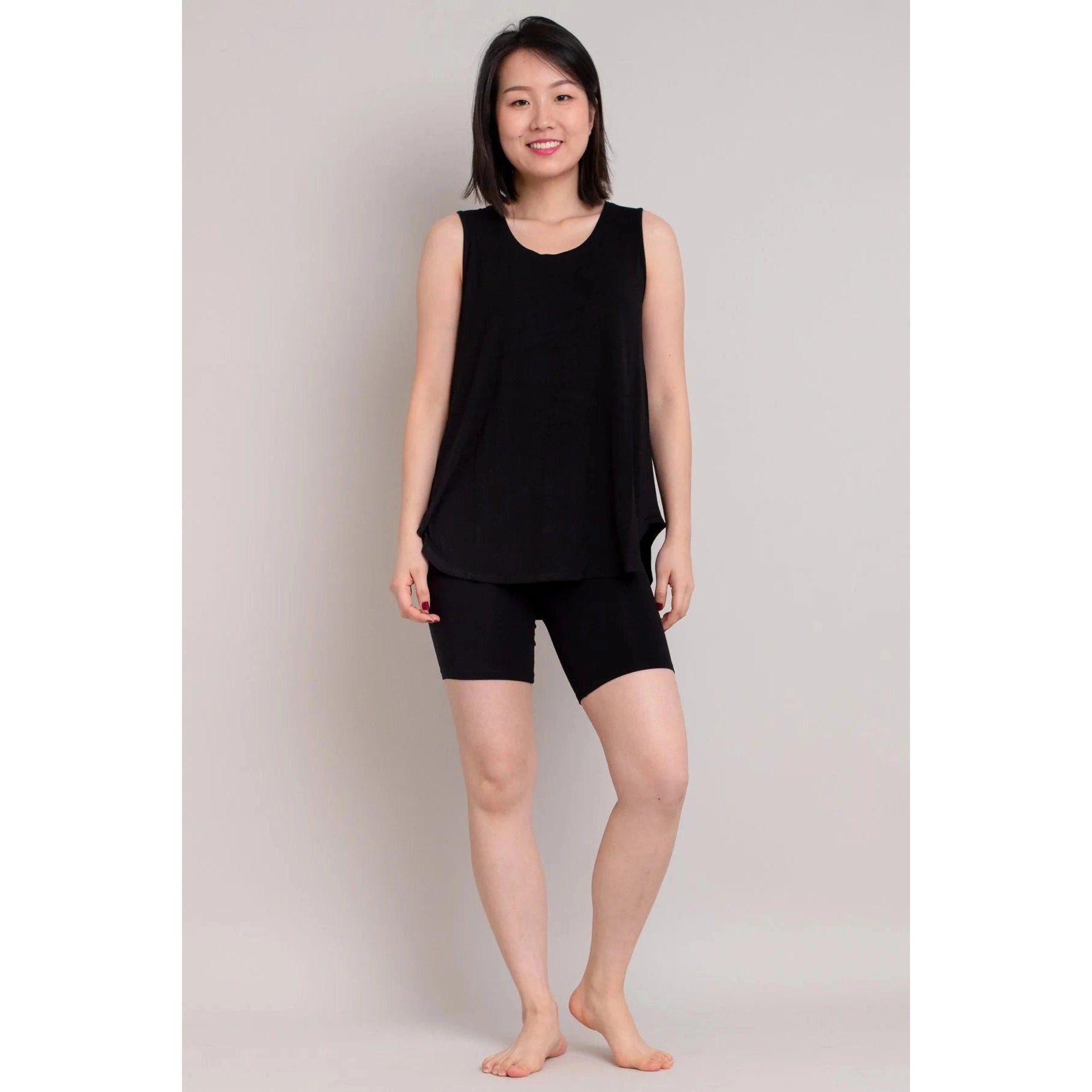 Blue Sky Hallie Undershorts in black shown on a model against a white background, from the front view, with the model wearing a black tank top to match. 
