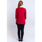 Blue Sky Jazz 3/4 Sleeve Top in Lipstick Red shown on a model wearing black leggings against a white background, from the back view. 
