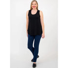 Blue Sky Jazz Tank in Black shown on a model wearing blue leggings standing against a white background, from the front view. 