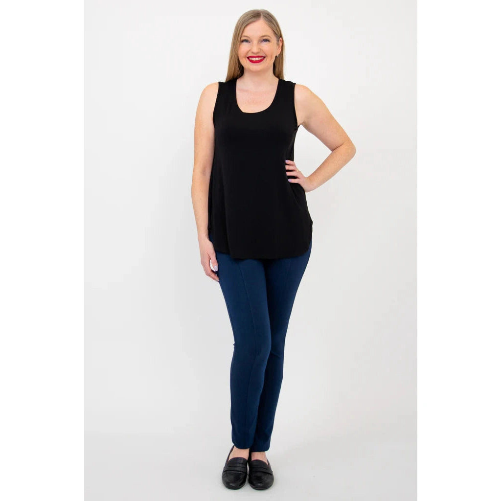 Blue Sky Jazz Tank in Black shown on a model wearing blue leggings standing against a white background, from the front view. 