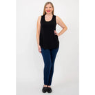 Blue Sky Jazz Tank in Black shown on a model wearing blue leggings standing against a white background, from the front view. 