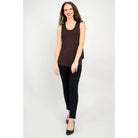 Blue Sky Jazz Tank in Coffee shown on a model wearing black leggings, against a white background, from the front view. 