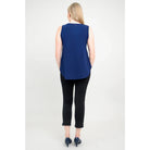 Blue Sky Jazz Tank in Indigo shown on a model wearing black leggings standing against a white background, from the back view. 