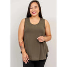 Blue Sky Jazz Tank in Khaki Green shown on a model wearing black leggings against a white background, from the front view. 