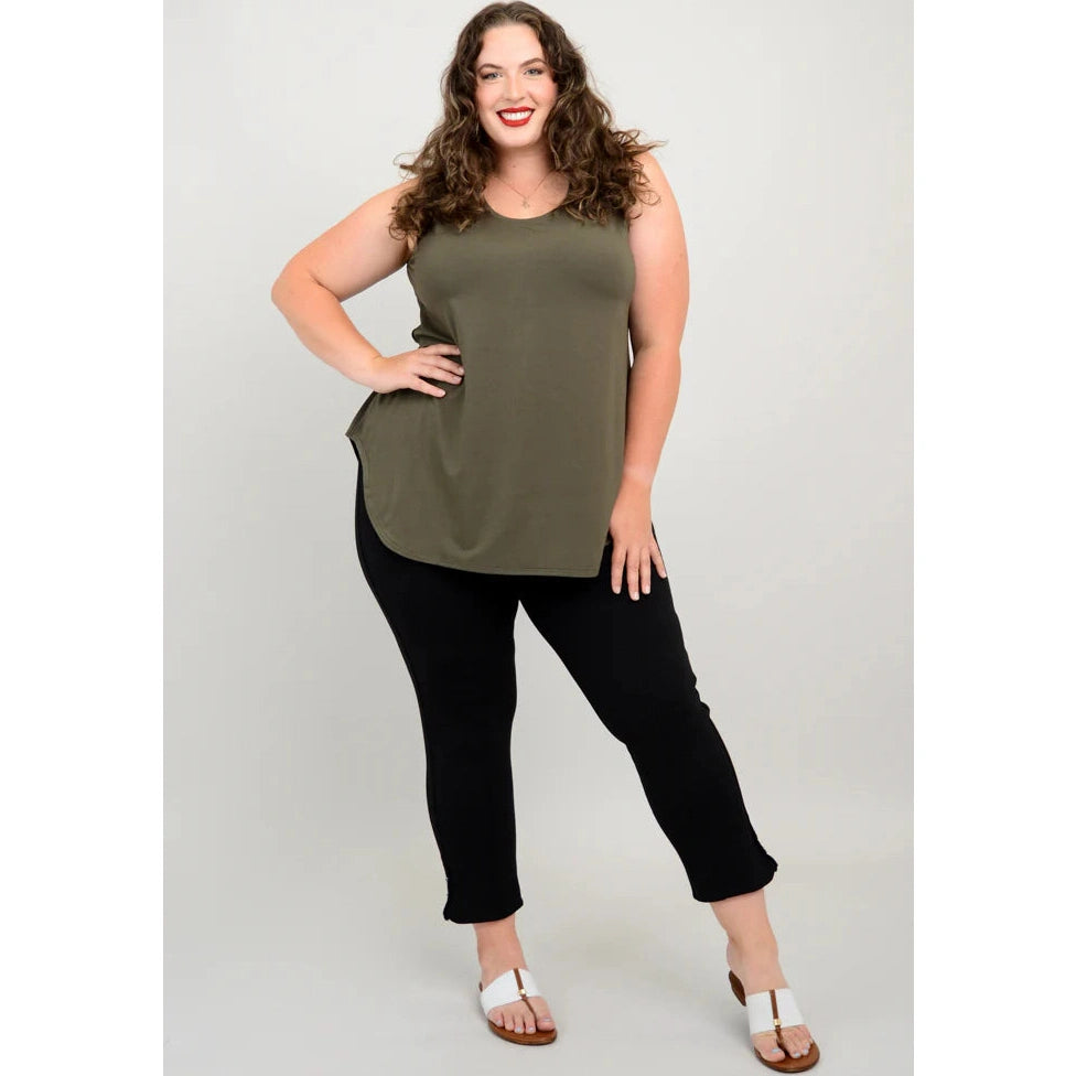 Blue Sky Jazz Tank in Khaki Green shown on a model wearing black leggings against a white background, from the front view. 