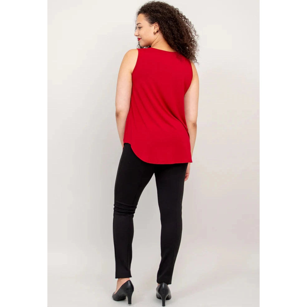 Blue Sky Jazz Tank in Lipstick Red shown on a model wearing black leggings against a white background, from the back view. 