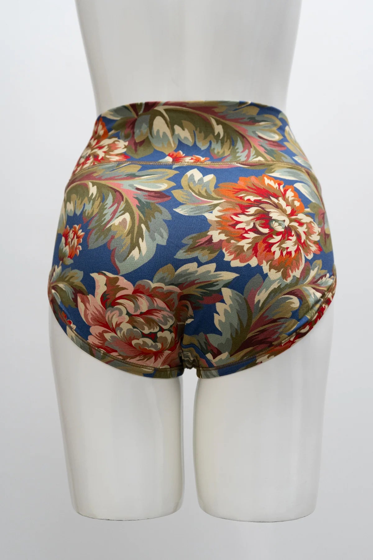 Blue Sky La Gaunche Full Brief in Khaki Vintage floral pattern shown on a mannequin against a white background, from the back view. 