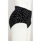Blue Sky La Gaunche Full Brief in Polka, black panty with white dots pattern, shown on a mannequin against a white background, from the side view. 