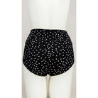 Blue Sky La Gaunche Full Brief in Polka, black panty with white dots pattern, shown on a mannequin against a white background, from the back view. 