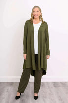 Blue Sky Priscilla Jacket in Khaki shown on a model wearing a white tank and khaki pants, standing against a white background, from the front view. 
