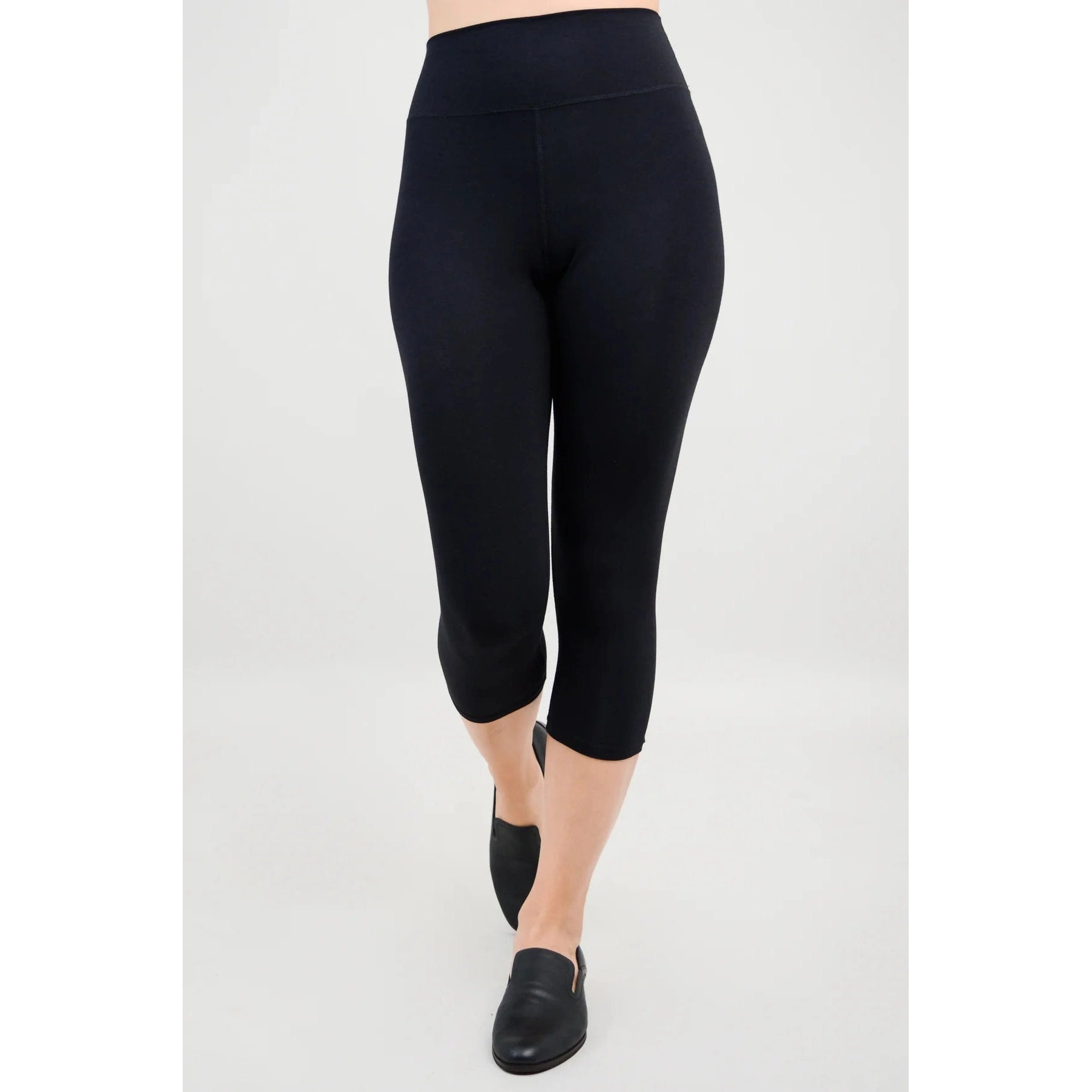 Blue Sky Riley Capris in Black shown on a model against a white background, from the front view. 
