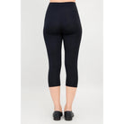 Blue Sky Riley Capris in Black shown on a model against a white background, from the back view. 