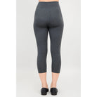 Blue Sky Riley Capris in Graphite shown on a mode against a white background, from the back view. 