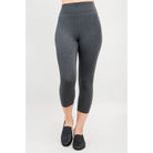 Blue Sky Riley Capris in Graphite shown on a mode against a white background, from the front view. 