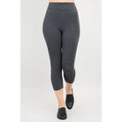 Blue Sky Riley Capris in Graphite shown on a mode against a white background, from the front view. 