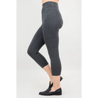 Blue Sky Riley Capris in Graphite shown on a mode against a white background, from the side view. 