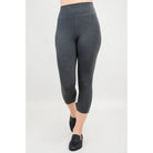 Blue Sky Riley Capris in Graphite shown on a mode against a white background, from the front view. 