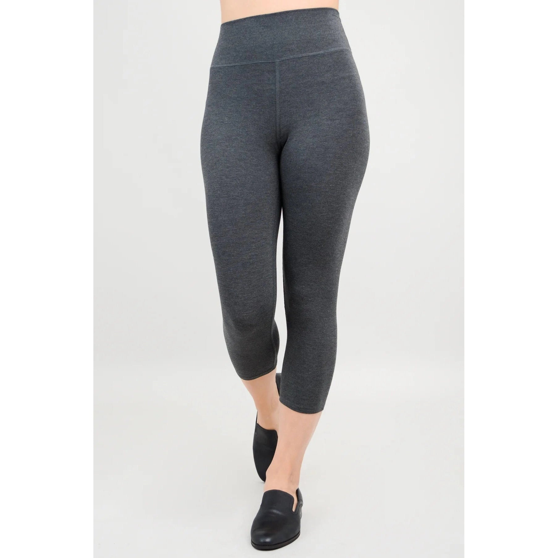 Blue Sky Riley Capris in Graphite shown on a mode against a white background, from the front view. 
