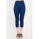 Blue Sky Riley Capris in Indigo shown on a model against a white background, from the front view. 