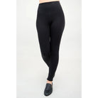 Blue Sky Riley Leggings in Black shown on a model against a white background, from the front view. 
