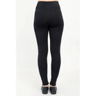 Blue Sky Riley Leggings in Black shown on a model against a white background, from the back view. 