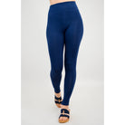 Blue Sky Riley Leggings in Indigo shown on a model against a white background, from the front view. 