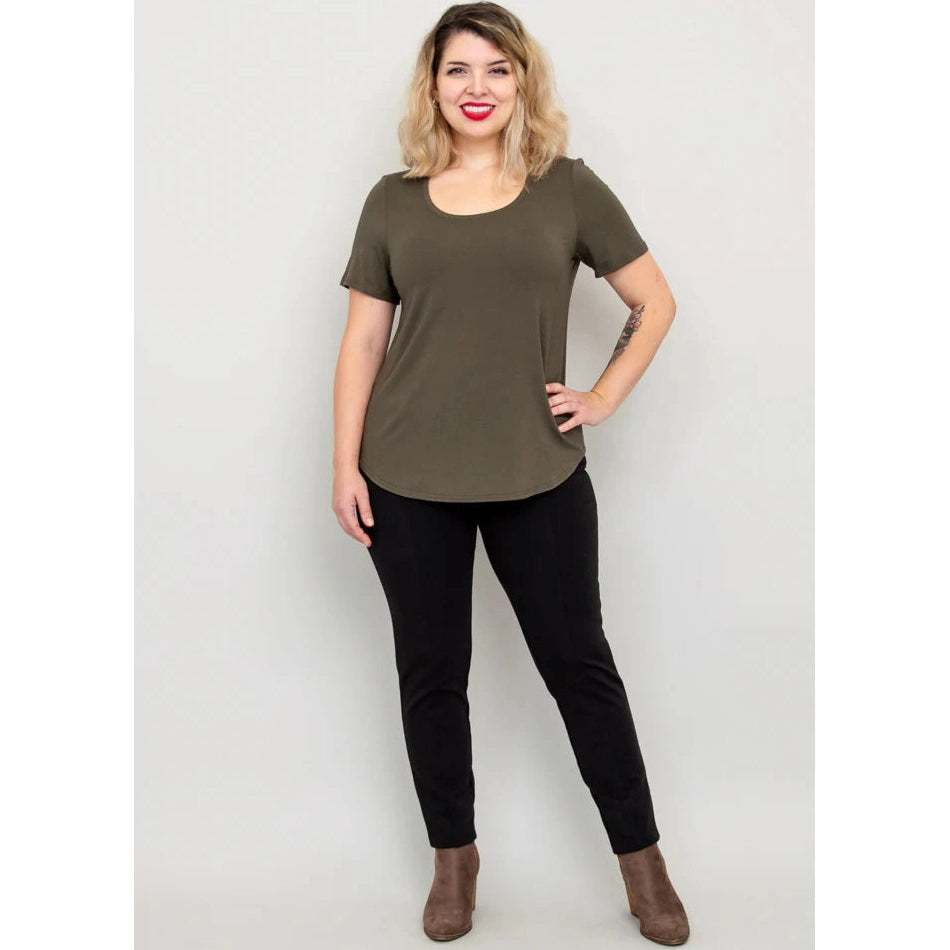 Blue Sky Tessa Tee in Khaki shown on a model wearing black leggings against a white background, from the front view. 