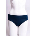 Blue Sky The Hipster panty in Indigo blue shown on a mannequin against a white background, from the front view.