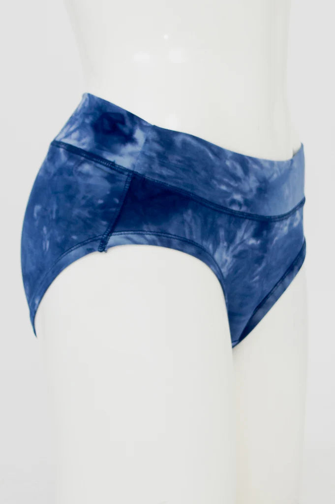 Blue Sky The Hipster panty in Tie Dye shown on a mannequin against a white background, from the side view. 