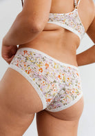 The Micro Hipster in Botanic patterned underwear on a model, showing the back view. 