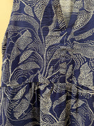 Navy blue fabric with white floral pattern