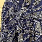 Navy blue fabric with white floral pattern
