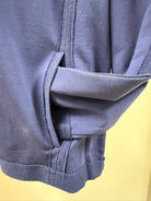 Close-up of a dark blue fabric with a yellow background