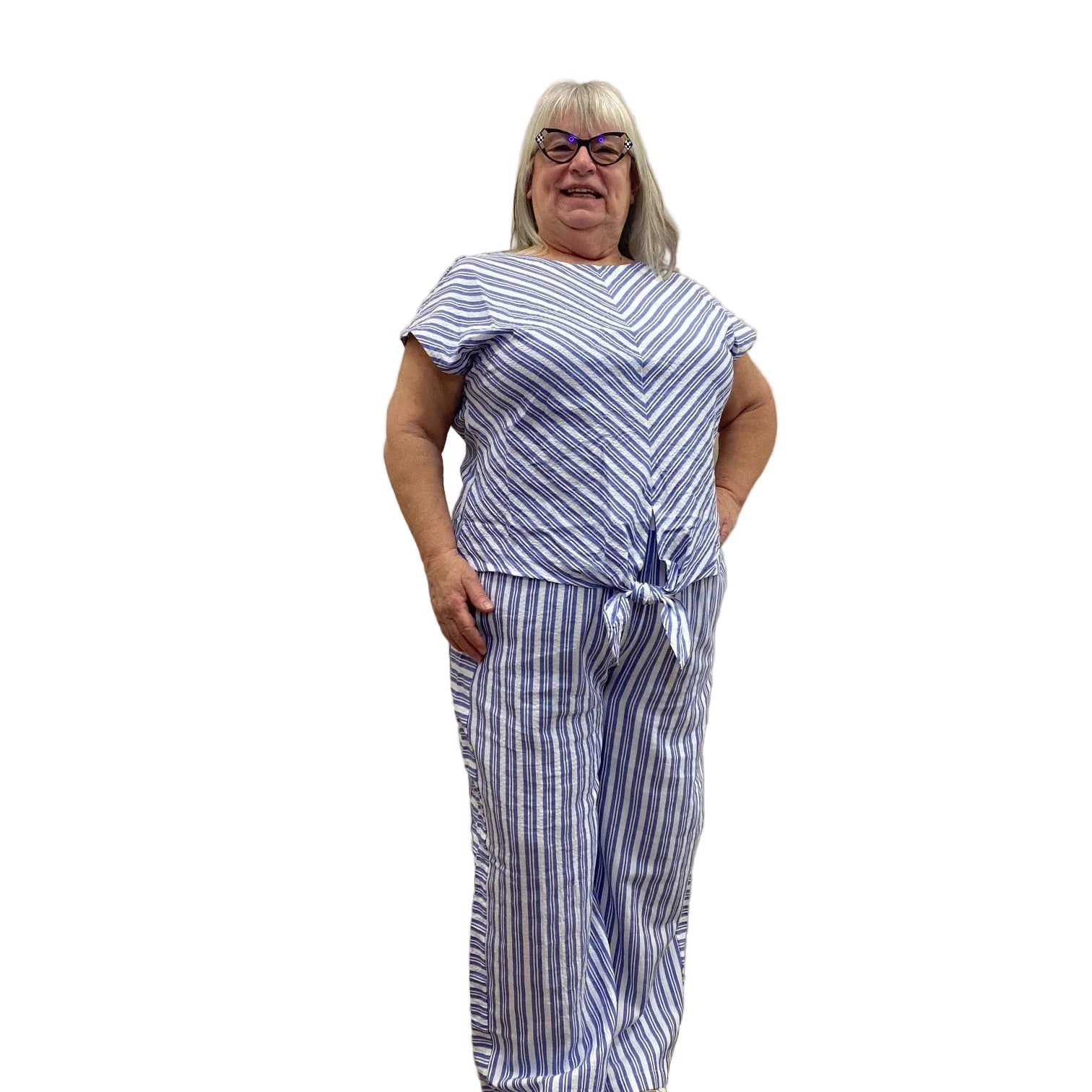 Woman wearing Escape Tie Front Top in Blue with blue and white stripes on white background. 