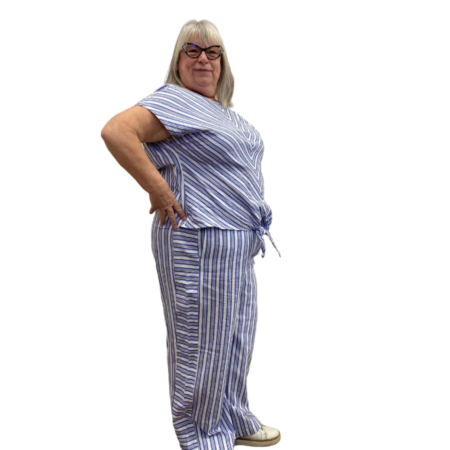 Woman wearing Escape Tie Front Top in Blue with blue and white stripes on white background. 
