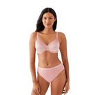 Back Appeal Seamless Bra in Rose Elegance shown on a model against a white background with a matching panty. 