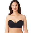 Woman wearing a black Wacoal Red Carpet strapless bra on a white background showing the front view. 