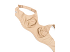 Wacoal Simone Underwired Sports bra in Sand laying on a white background showing the inside of the bra. 