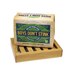 Bamboo soap dish shown against a white background with a bar of soap on top. 