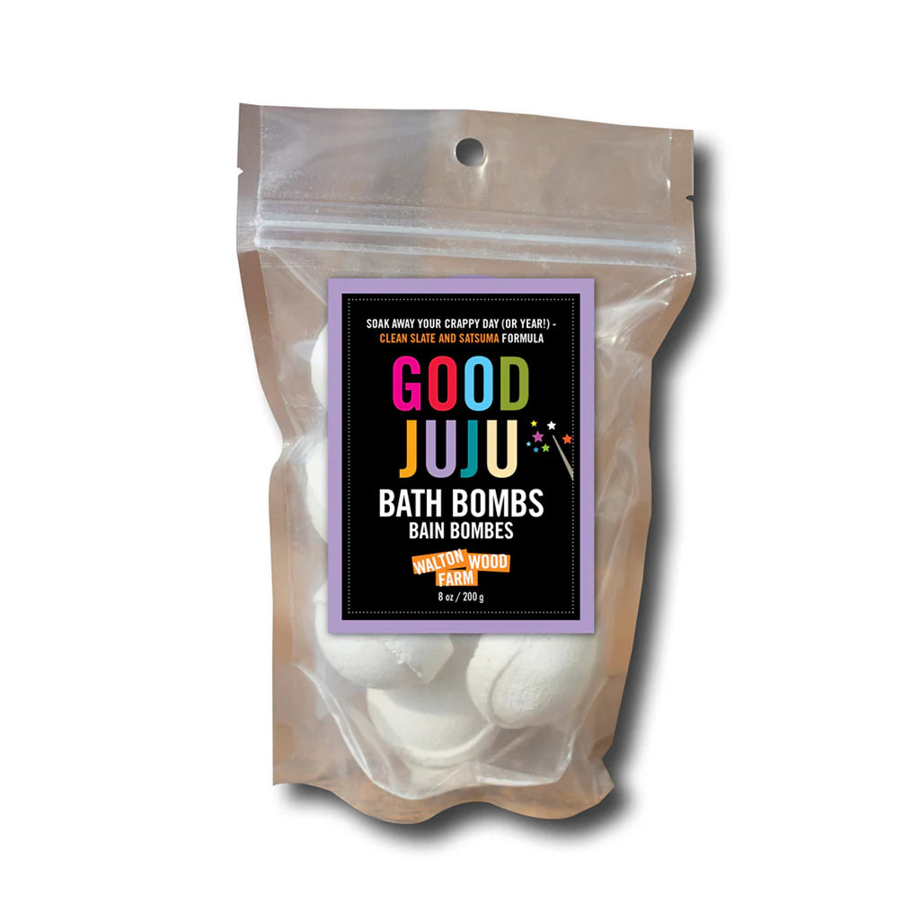 Packaged bath bombs with a colorful label on a white background