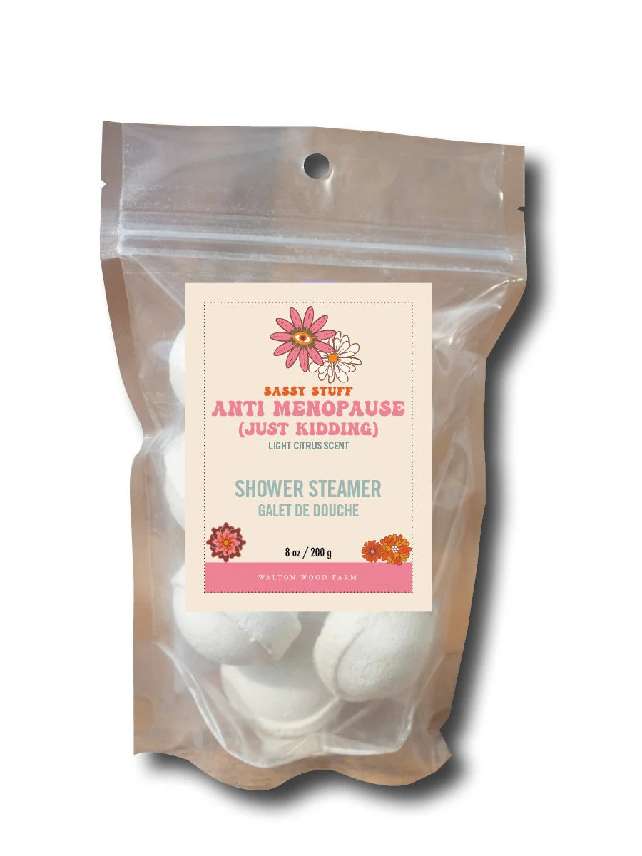 Shower steamer packaging with a label on a white background