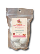 Shower steamer packaging with a label on a white background