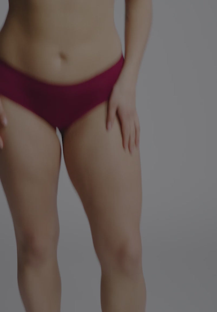Video of Model showing details on the Micro Hipster in Rosewood. 